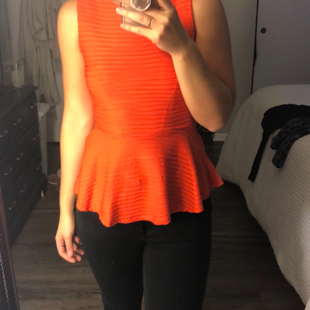 Orange textured peplum tank